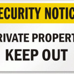 Sign reading Security notice private property keep out