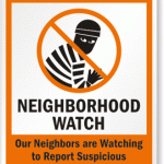 Neighborhood Watch sign with a burglar crossed out.