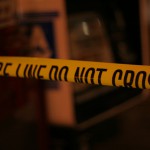 Yellow police tape across a crime scene.