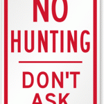 Sign that reads: No hunting, don't ask