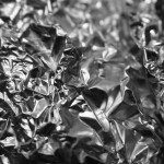 A close-up of crumpled tin foil.