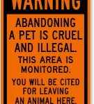 Sign that reads: Abandoning a pet is cruel and illegal. This are is monitored. You will be cited for leaving an animal here.