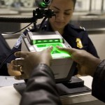A traveler has his fingerprints taken at Dulles Airport in Washington.