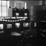 A man looking at CCTVs